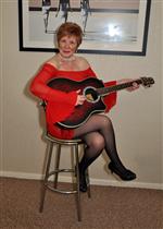 Jackie Plays The Guitar